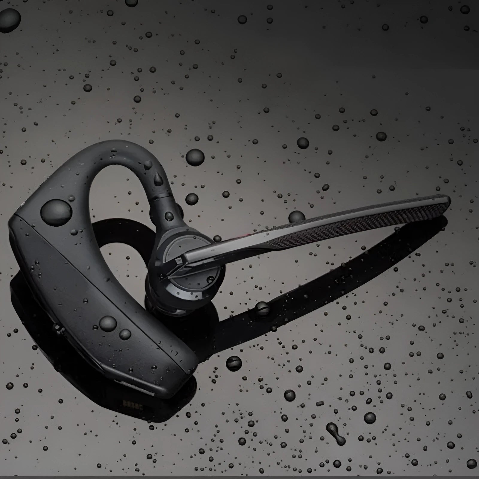Black plastic Bluetooth sports headphones with over-ear design and USB charging port