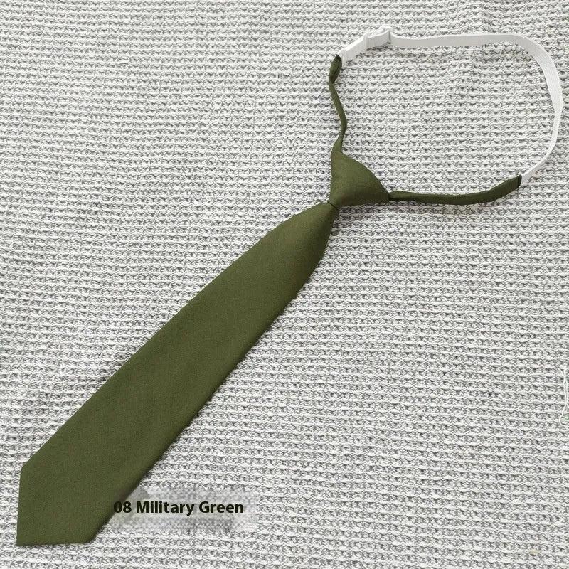 Men's navy blue cotton bow tie with arrow-style design on a white background.