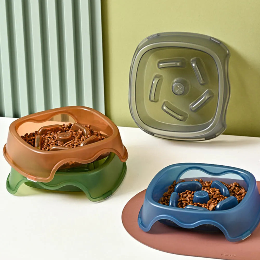 Plastic slow feeder dog bowl in blue, grey, green, and orange colour options