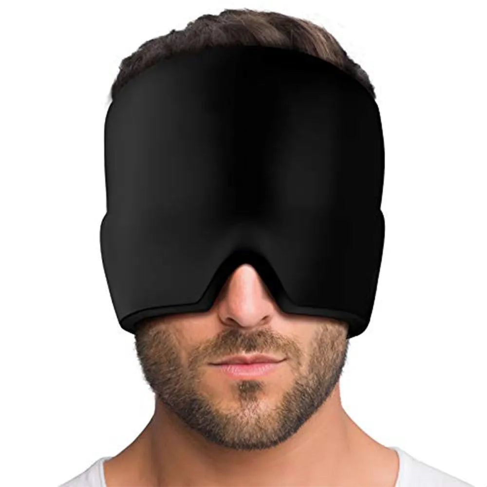 Black elastic cloth gel cold therapy eye mask for headache relief on grey background.