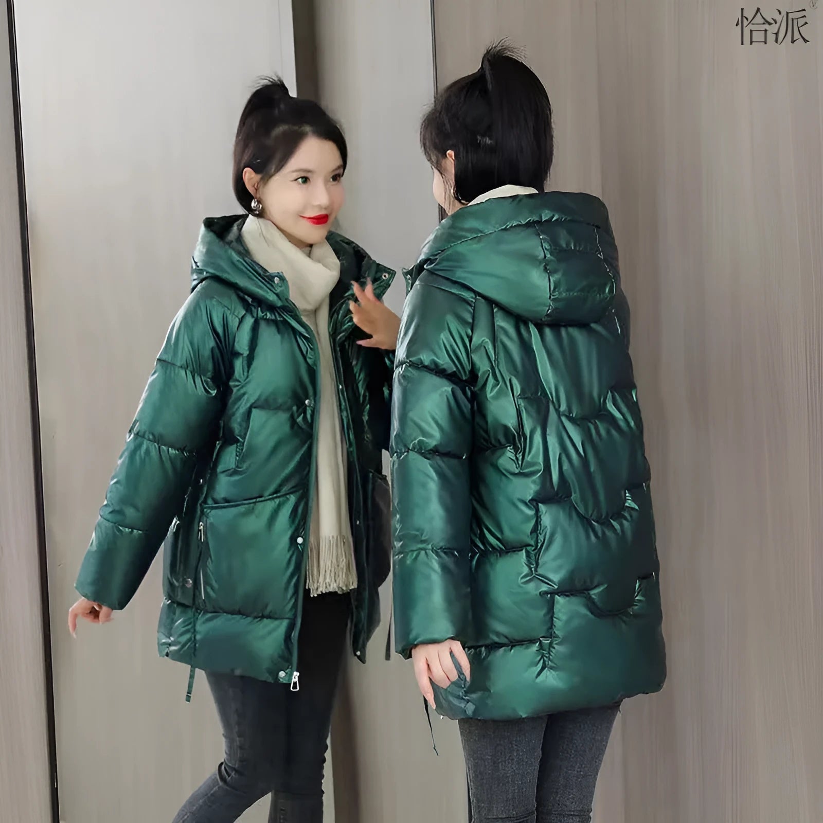 Women's loose fit winter hooded jacket in black colour with regular sleeves