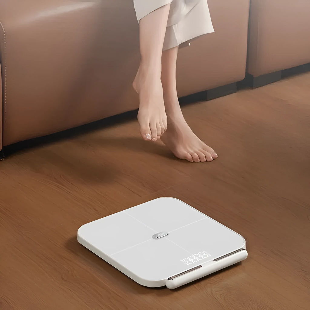 Professional white body fat scale with eight electrodes and tempered glass platform measuring 30x30cm