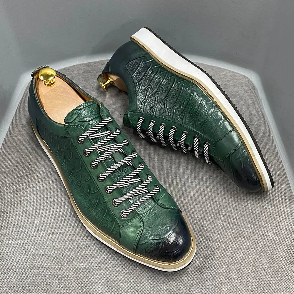 Men's low-top shoes with a handmade embossed pattern on the upper and front lace closure.