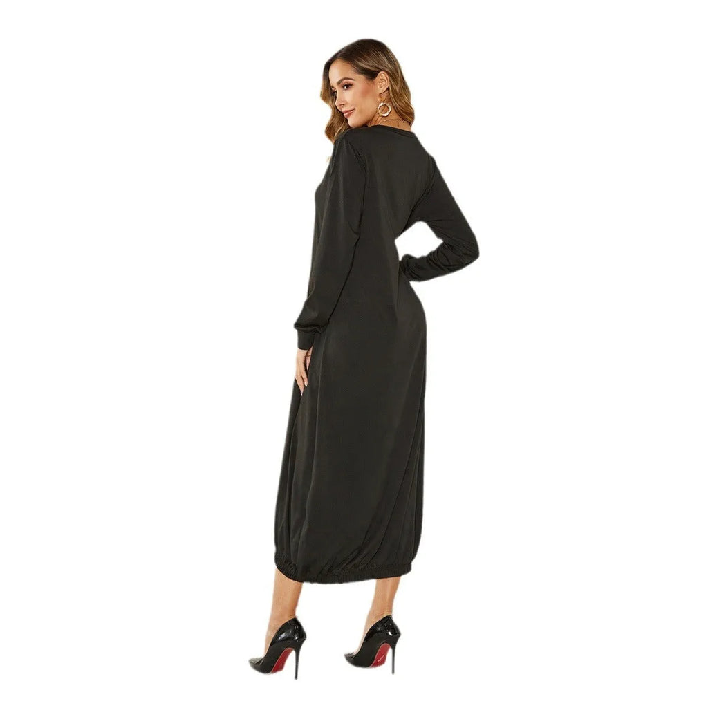 Black lantern dress with lace-up crew neck and loose silhouette, shown front view