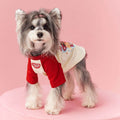 Summer dog clothes made of cotton in embroidered red, showing contrast colour details.