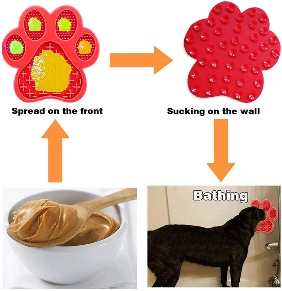 Blue silicone dog licking mat with bone texture and suction cups on the back, placed on a tiled wall.