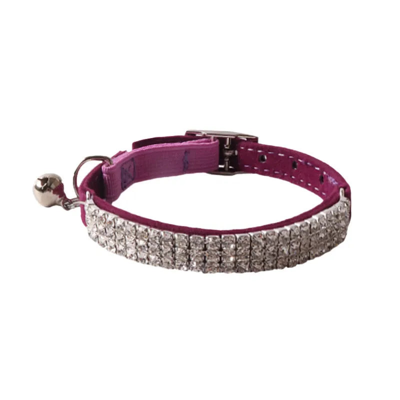 Elastic buckle cat collar in assorted colours with breakaway clasp, showing flocked material texture