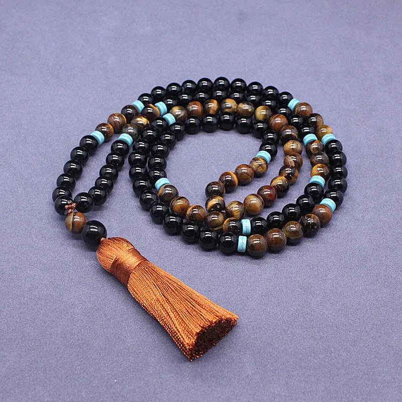 Black agate and tigereye bead bracelet and necklace set with tiger shape stone.