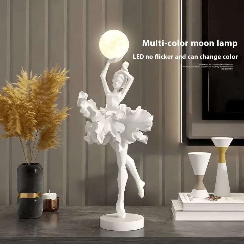 Small modern resin night lamp with USB charging port in black gold colour.