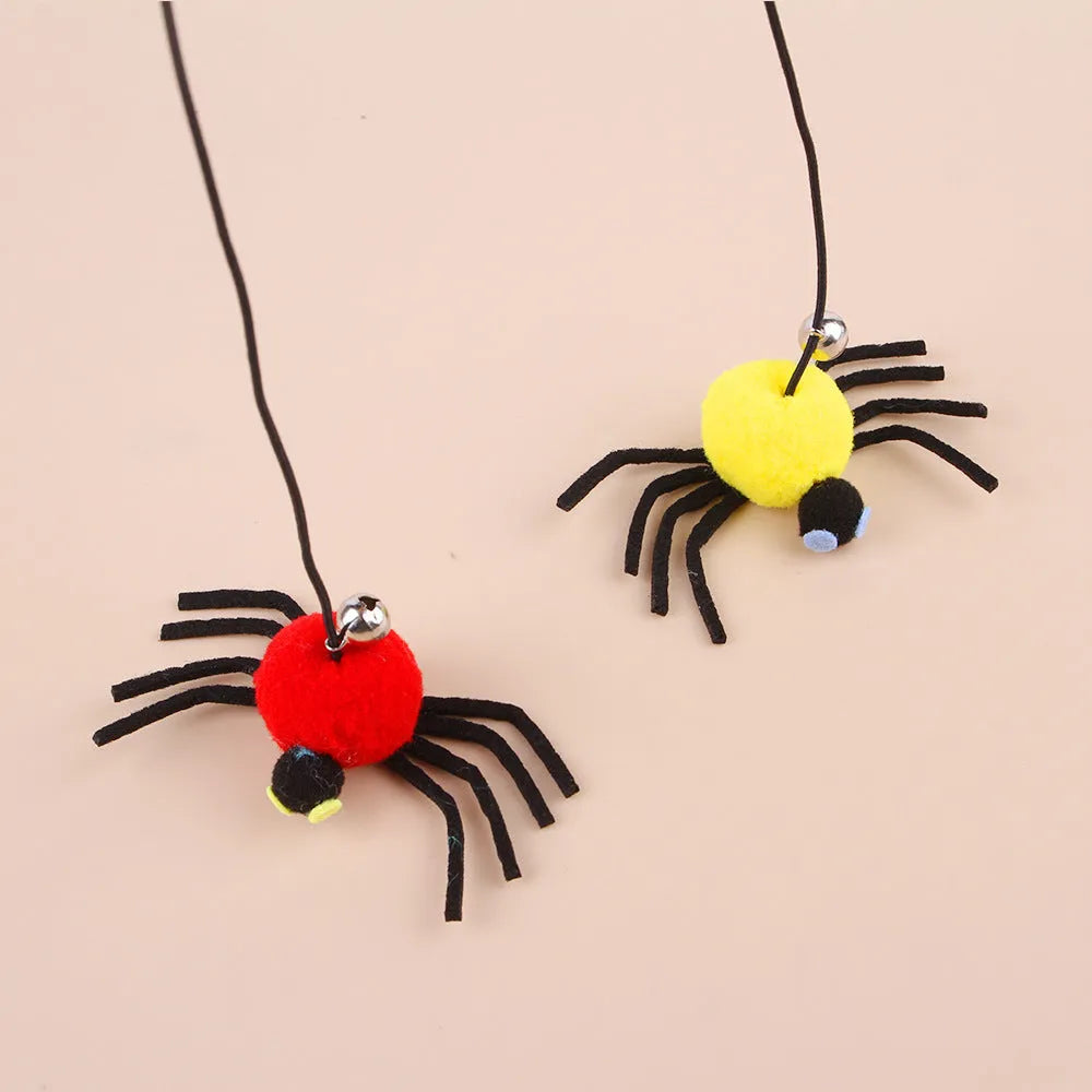 Cat hanging door toy with red feather and bell spider dangling from elastic rope