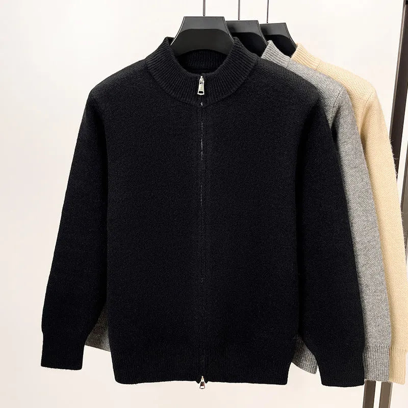 Men's loose grey knitted cardigan with a stand collar and a front zipper.