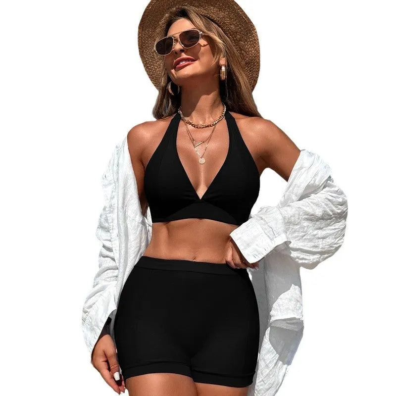 Women's black nylon bikini swimsuit with polyester lining, sized for adult women.