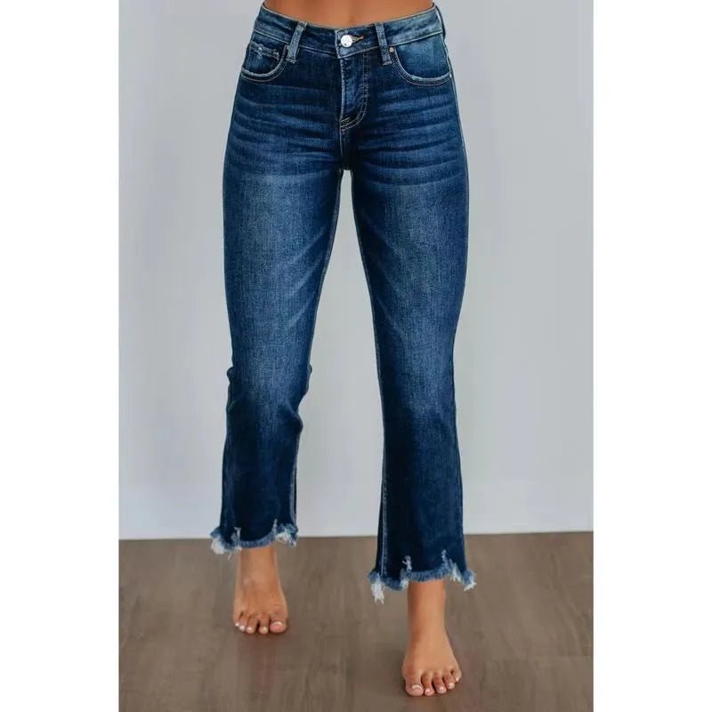 Women's solid colour denim jeans with hand-sanded distressing in dark blue and light blue colour options