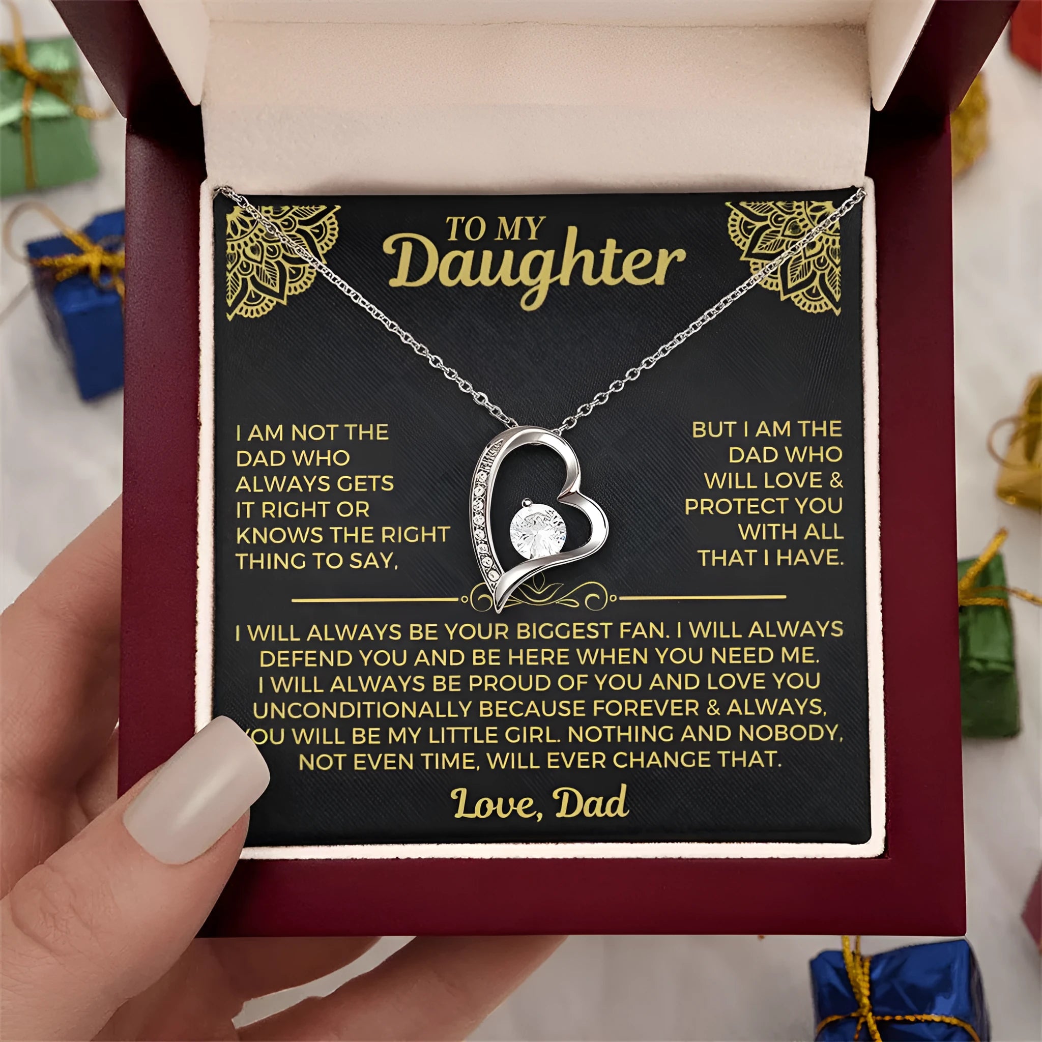 Hollow heart-shaped pendant necklace in silver or gold tone with mixed material construction and gift packaging