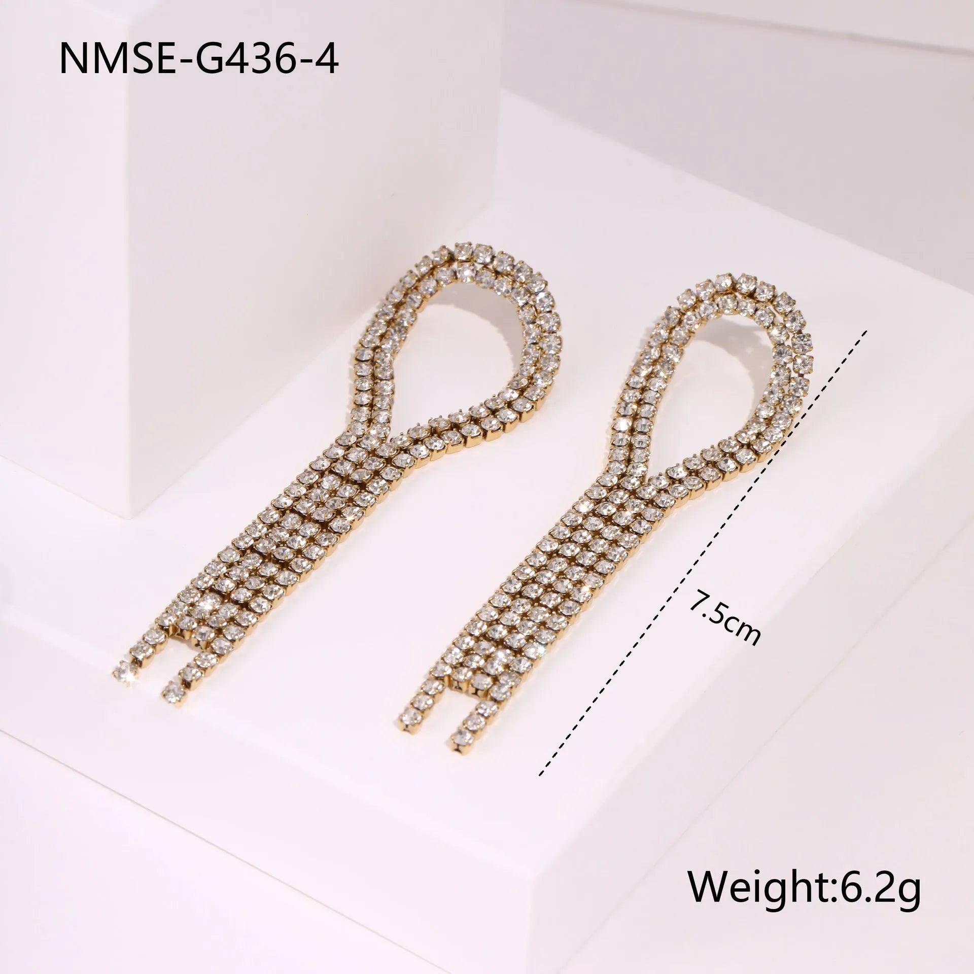 Gold plated stainless steel earrings with love heart and star geometric shapes and diamond tassel details
