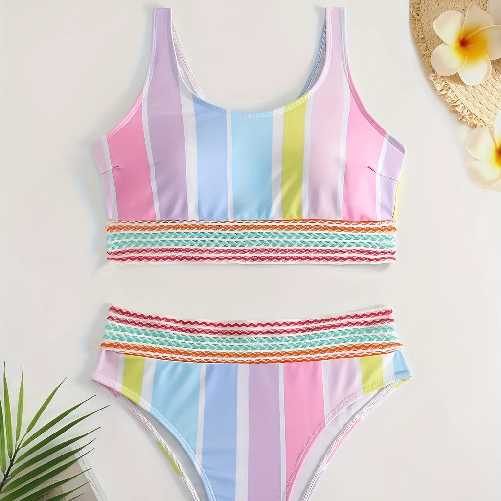 Women's striped blue and white sports bikini set on a mannequin