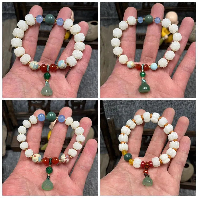 Carved pumpkin lotus bodhi root bracelet with white jade segments and golden silk jade treasures