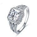 Women's platinum-coloured hollow geometric ring with quadrilateral ornament design and inlaid zircon stones