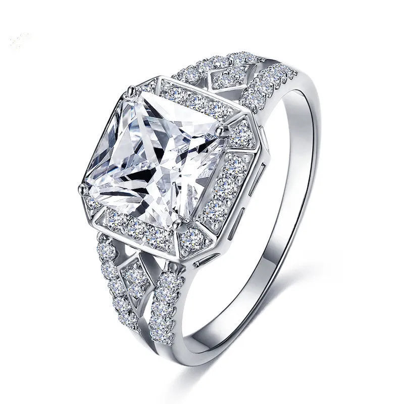 Women's platinum-coloured hollow geometric ring with quadrilateral ornament design and inlaid zircon stones