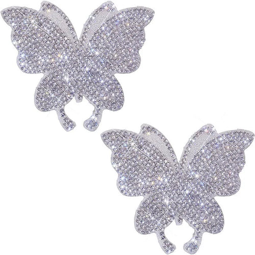 Diamond-encrusted glass car sticker with bear paw or butterfly design measuring 7 by 6 cm