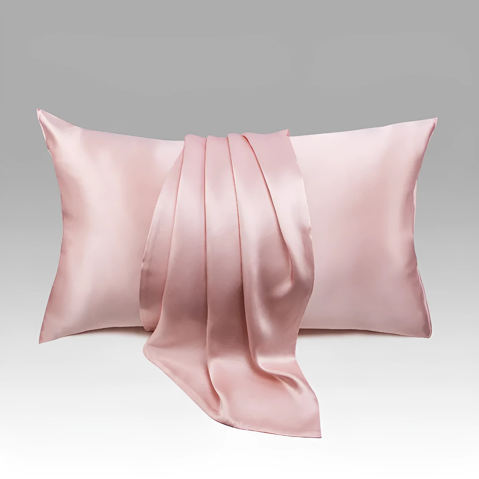 Dark grey 19 momme mulberry silk pillowcase with an envelope closure, laid flat.