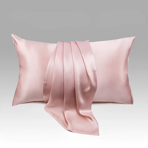 Dark grey 19 momme mulberry silk pillowcase with an envelope closure, laid flat.
