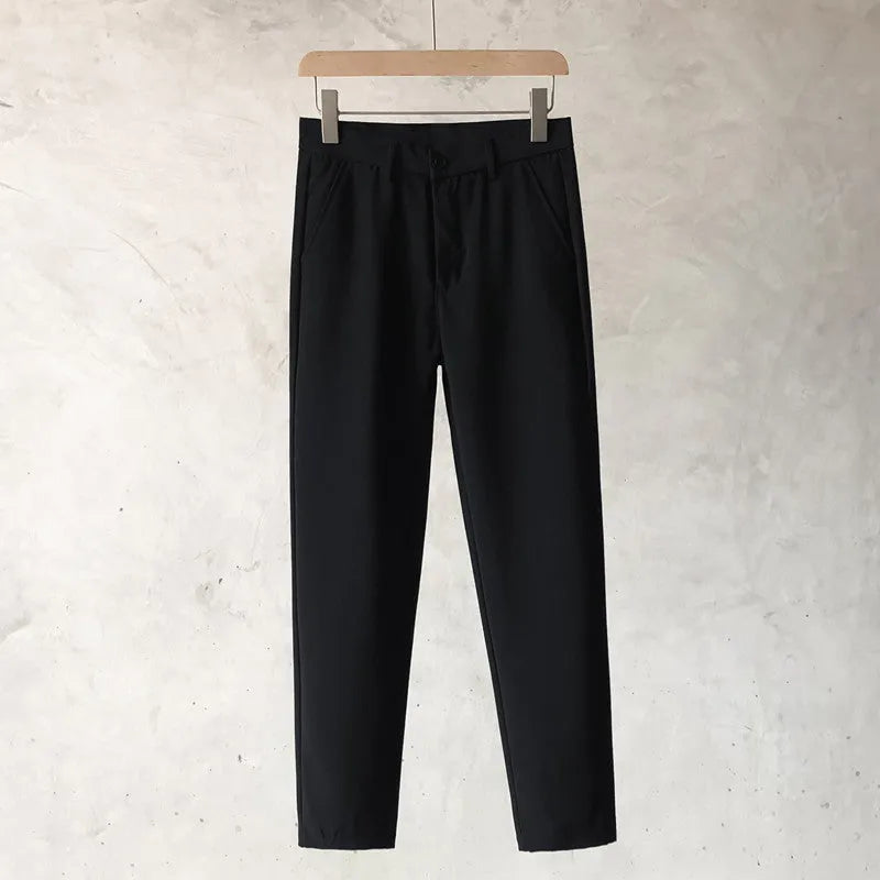 Boys slim straight wool trousers in business casual style with tapered fit and matching belt