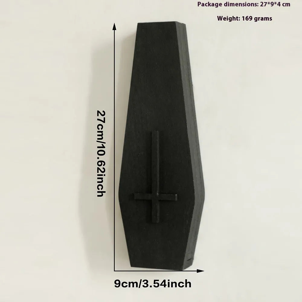 Black wooden cross-shaped wall shelf decoration measuring 27cm by 9cm