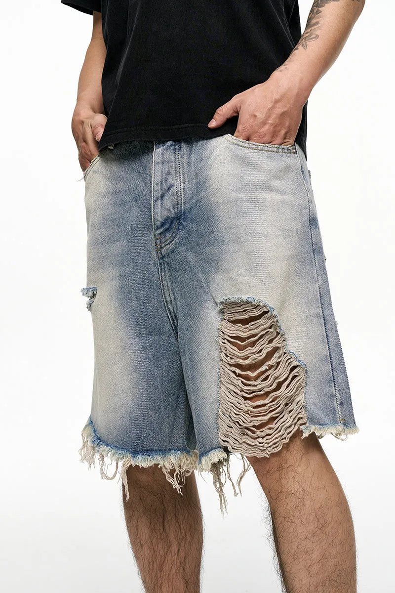 Light blue men's retro washed denim shorts with baggy wide leg fit