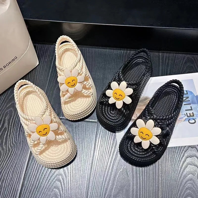 Beige women's round-toe sandals with sunflower pattern and non-slip PVC sole.