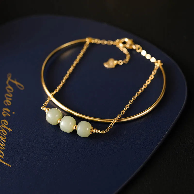 Women's Hetian jade lucky beads bracelet with gold inlay treatment in single, double, and three beads versions