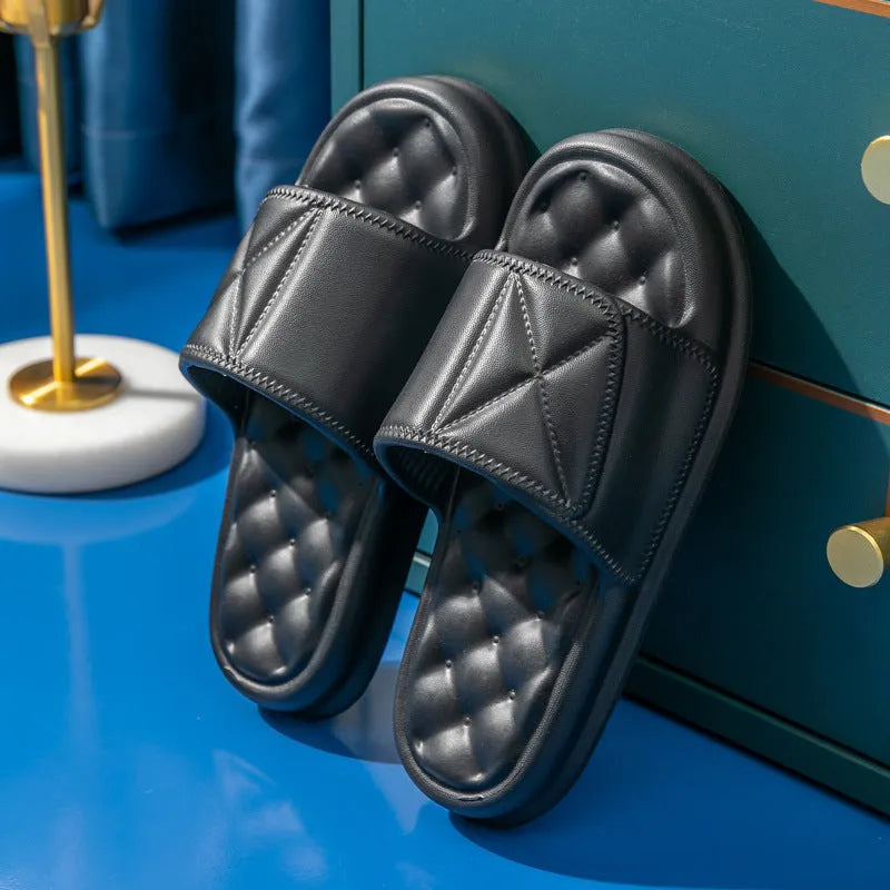 Pair of thick-soled EVA bathroom sandals in a chosen colour, showing moulded non-slip sole design.