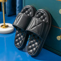 Pair of thick-soled EVA bathroom sandals in a chosen colour, showing moulded non-slip sole design.