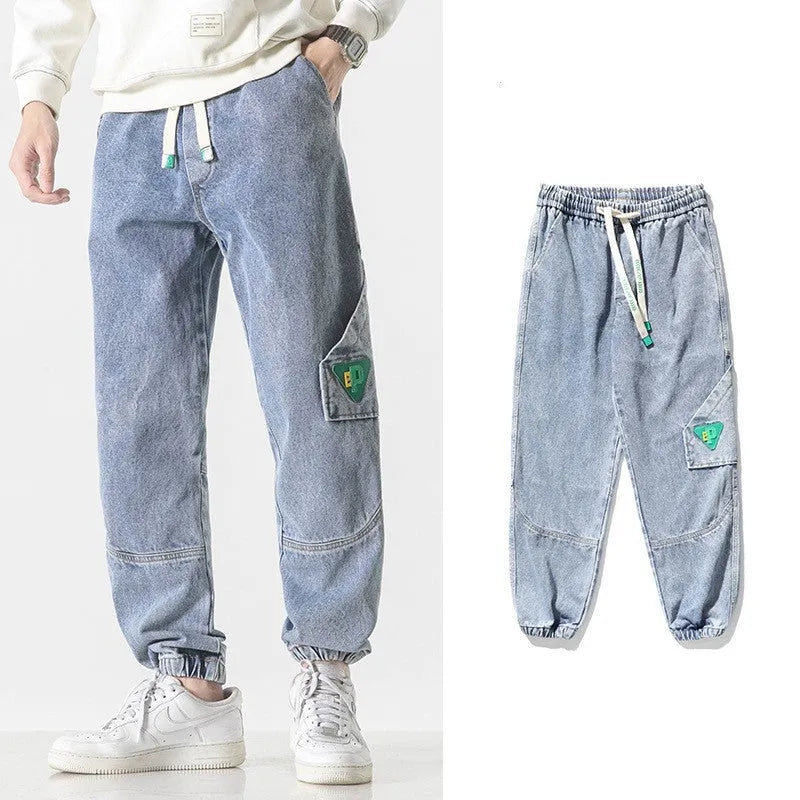 Men's cotton loose-fit tapered trousers in black, blue, or grey colours with mid-waist design