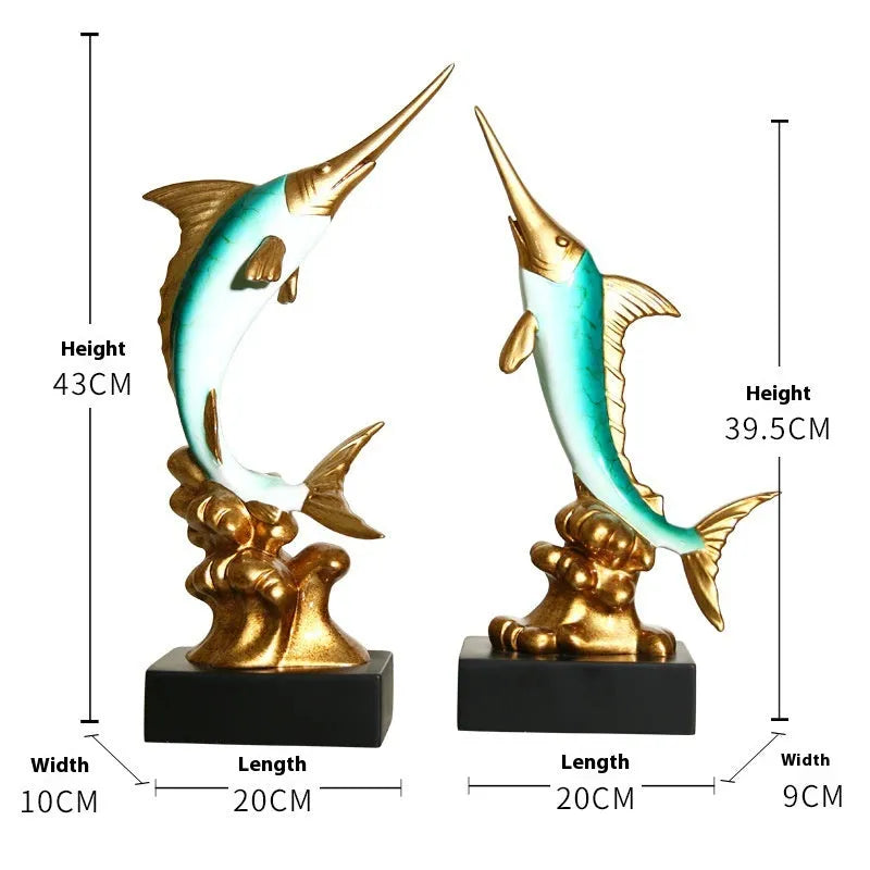 Close-up of a detailed resin European swordfish ornament in bright gold colour on a shelf.