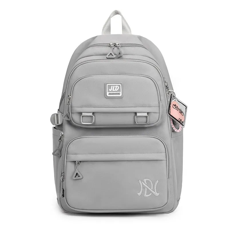 Large capacity girls' school backpack in nylon, showing colour options and physiological back support design.