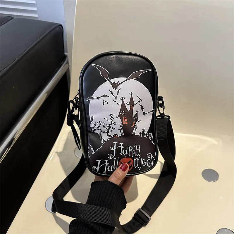 Halloween graffiti print crossbody bag showing pumpkin, ghost and bat designs in medium 14x23x9.5cm size