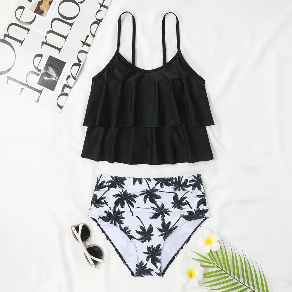 Women's black high-waist two-piece swimsuit with coconut tree print option, shown as a top and briefs set.