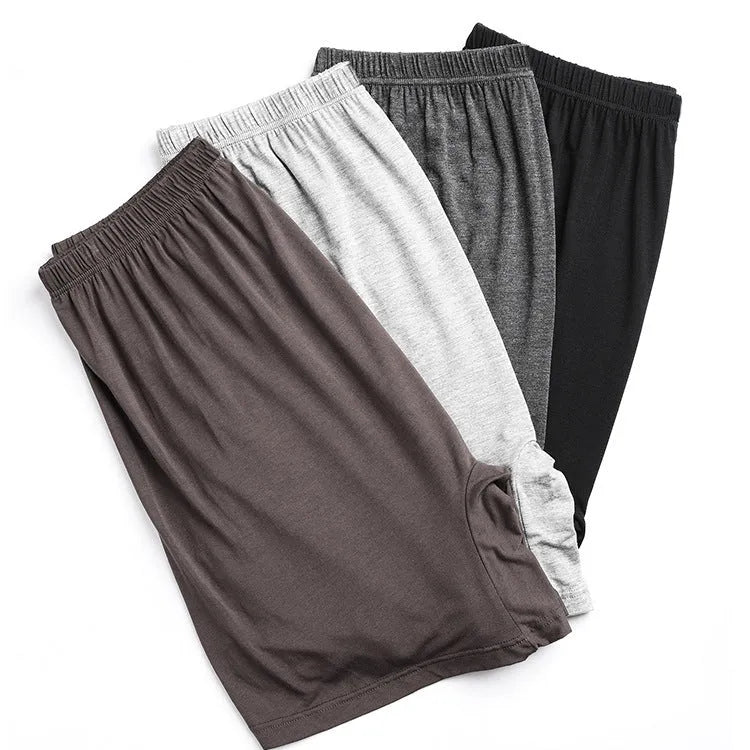 Men's solid colour high-waist boxer shorts made from modal fabric, shown in black, on a white background.