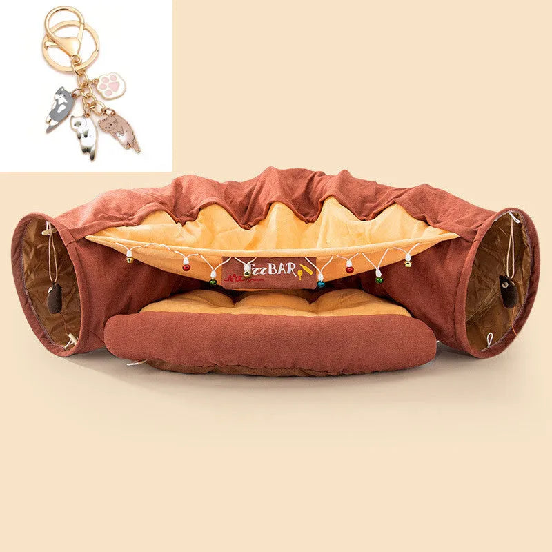 Collapsible cloth cat tunnel in Pink colour, shown extended for play.