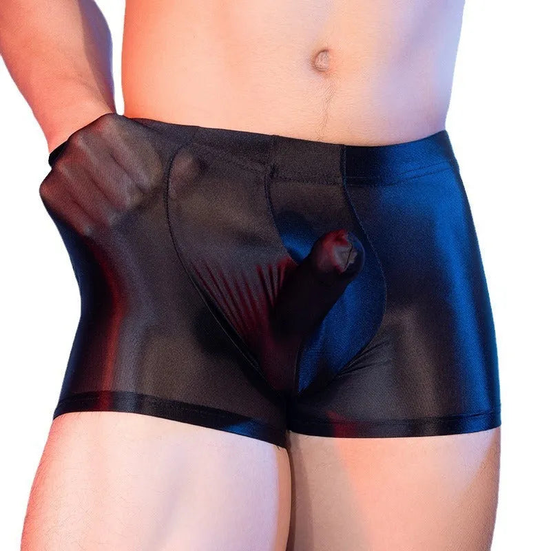 Men's red boxer shorts with a seamless nylon build and a printed elephant nose design on the front.