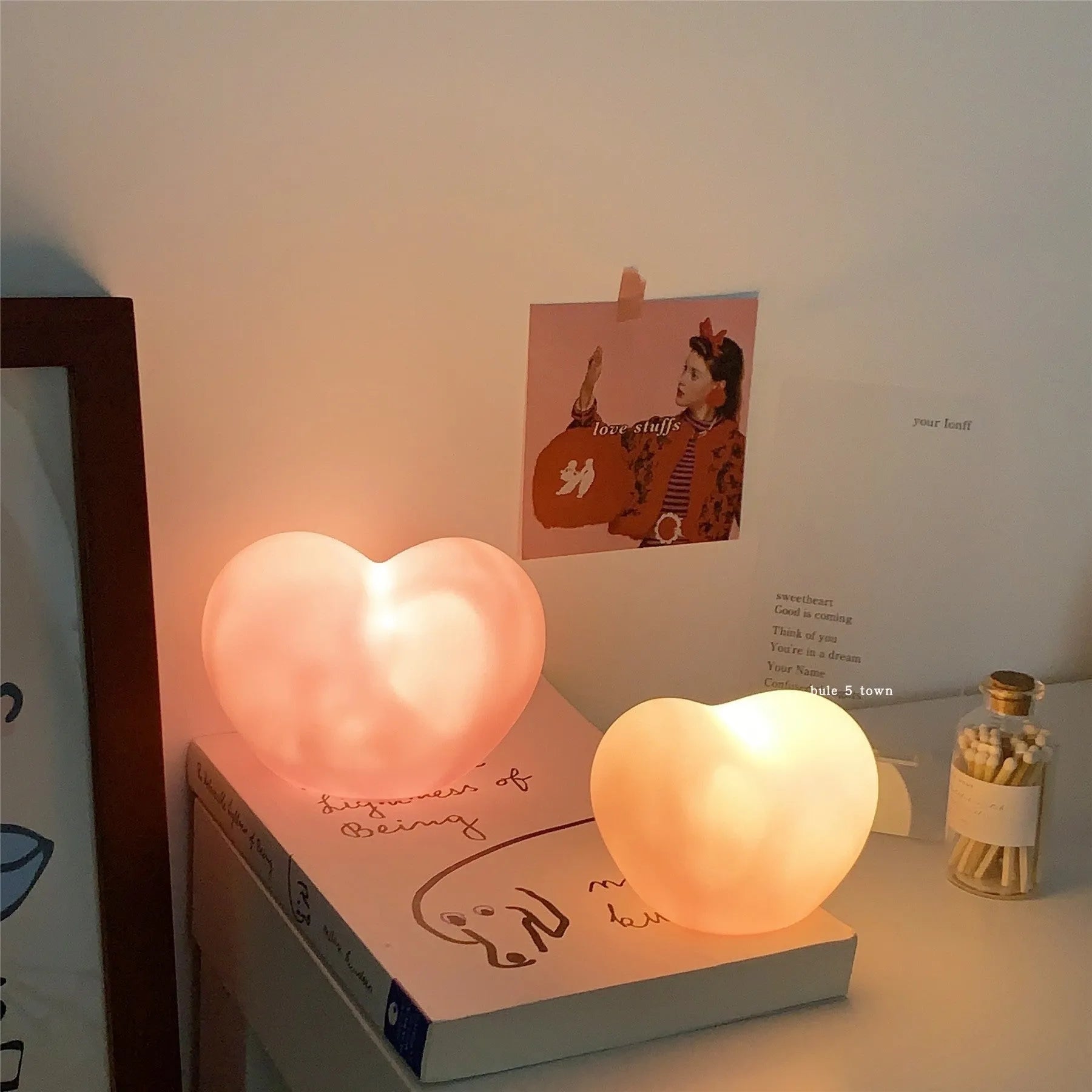 White and pink vinyl atmosphere lamps showing small and large size options for decorative lighting