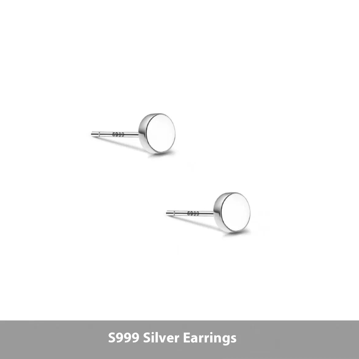 A pair of simple, round, flat-fronted S999 sterling silver ear bone studs on a plain background.