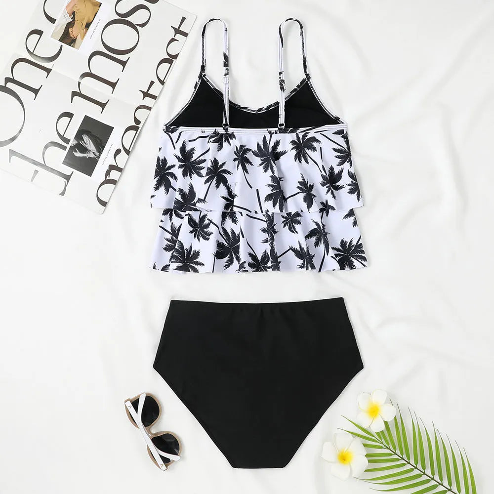 Women's black high-waist two-piece swimsuit with coconut tree print option, shown as a top and briefs set.