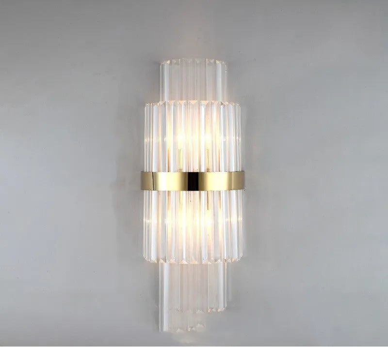 Modern crystal wall lamp with petal design in titanium gold finish
