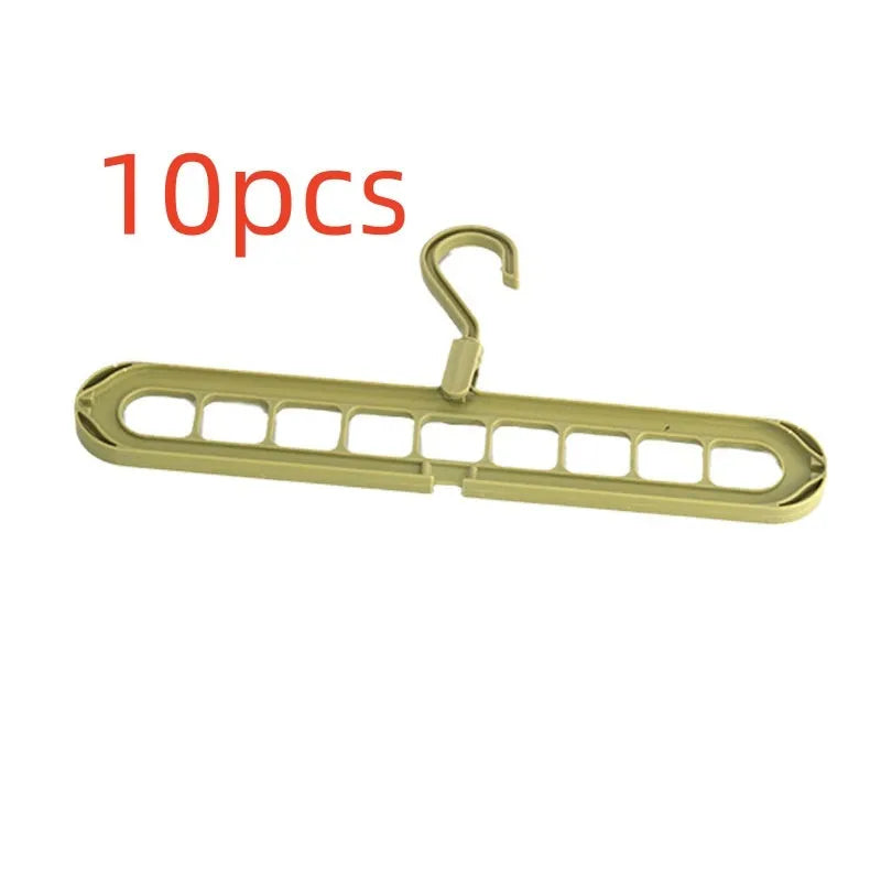 Multifunctional plastic nine-hole folding hanger for trousers, shown in beige, blue, green, pink, and grey colour options.