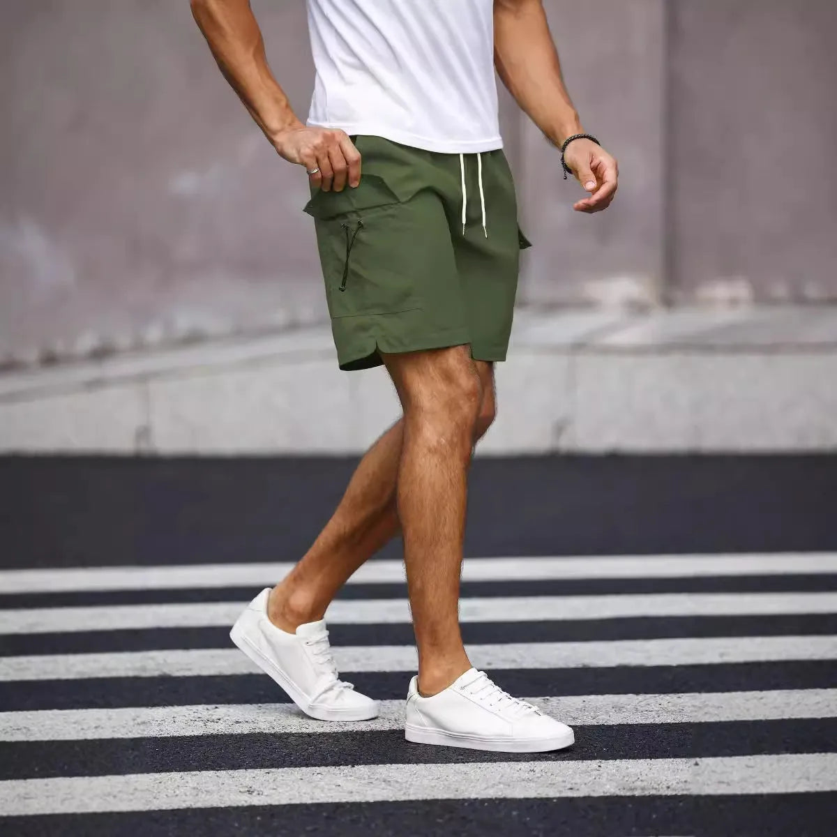 Men's loose fit work shorts in fluorescent green or army green colours with straight leg design