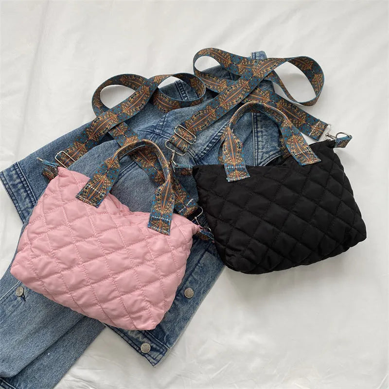 Soft Oxford cloth messenger bag with embroidery details and internal phone pocket in horizontal square shape