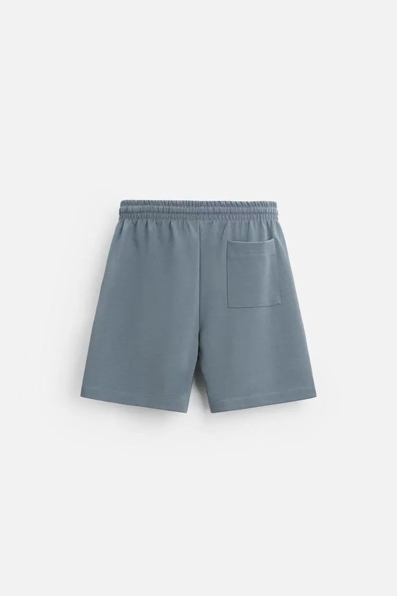 Short sleeve top and matching shorts set with double-sided cloth texture in urban style
