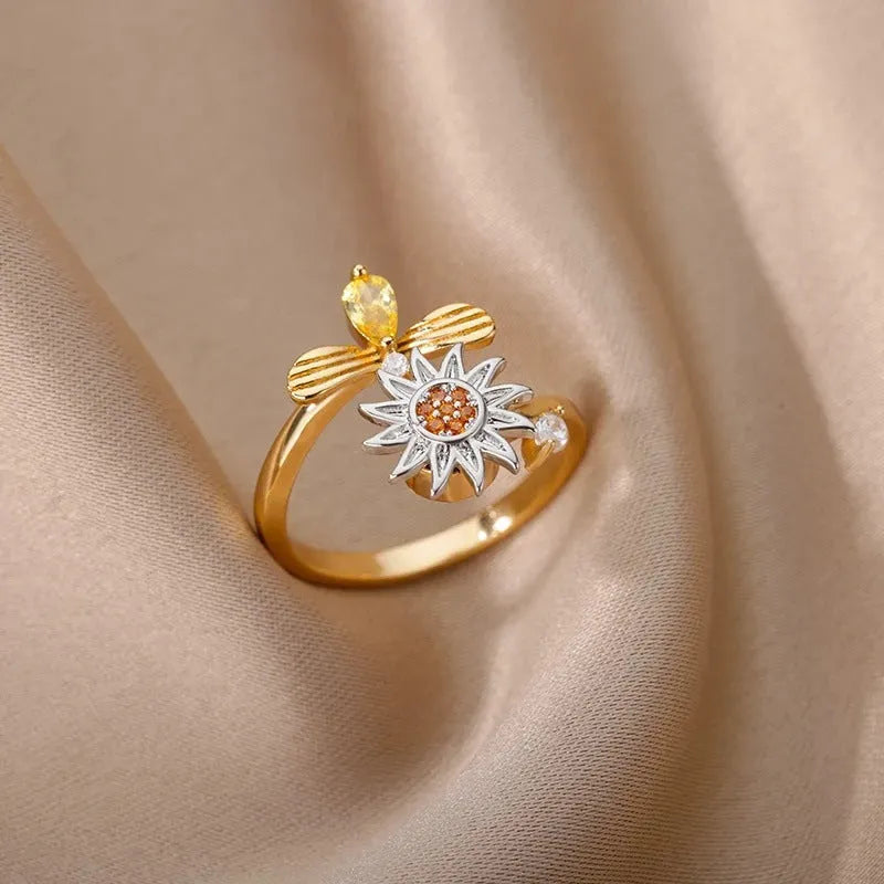 Simple geometric copper decompression ring with adjustable opening in gold colour.